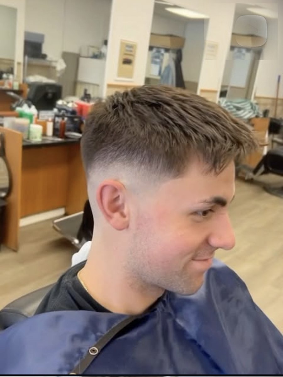 Short back and sides with a soft natural finish at Plaza Barber Shop West Hempstead
